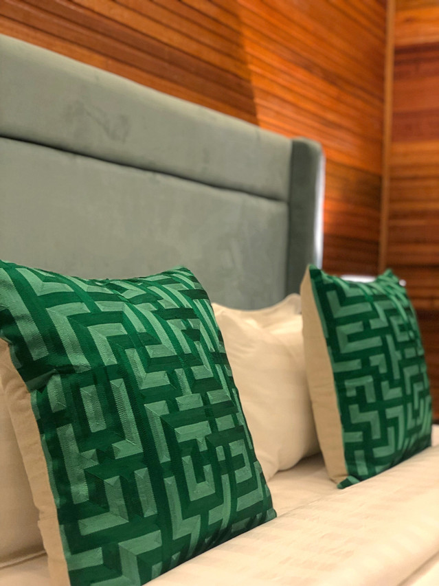 Deluxe Villa bed facing ocean balcony