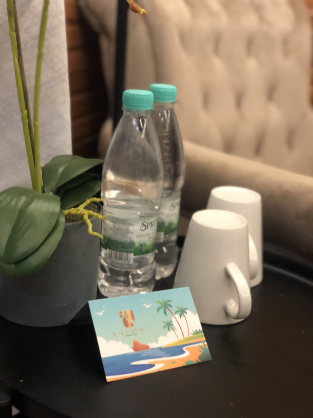 Deluxe Villa room snacks and water