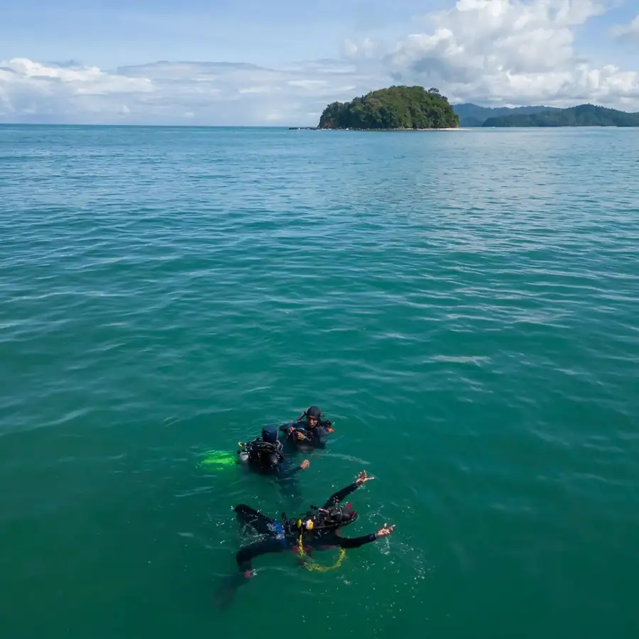 Scuba diving in the waters near Sky Water Villas