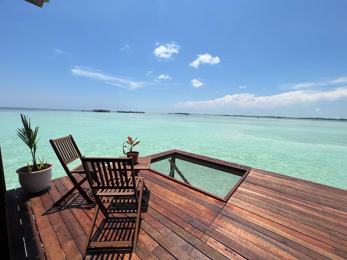 Premier Villa loungers on ocean deck