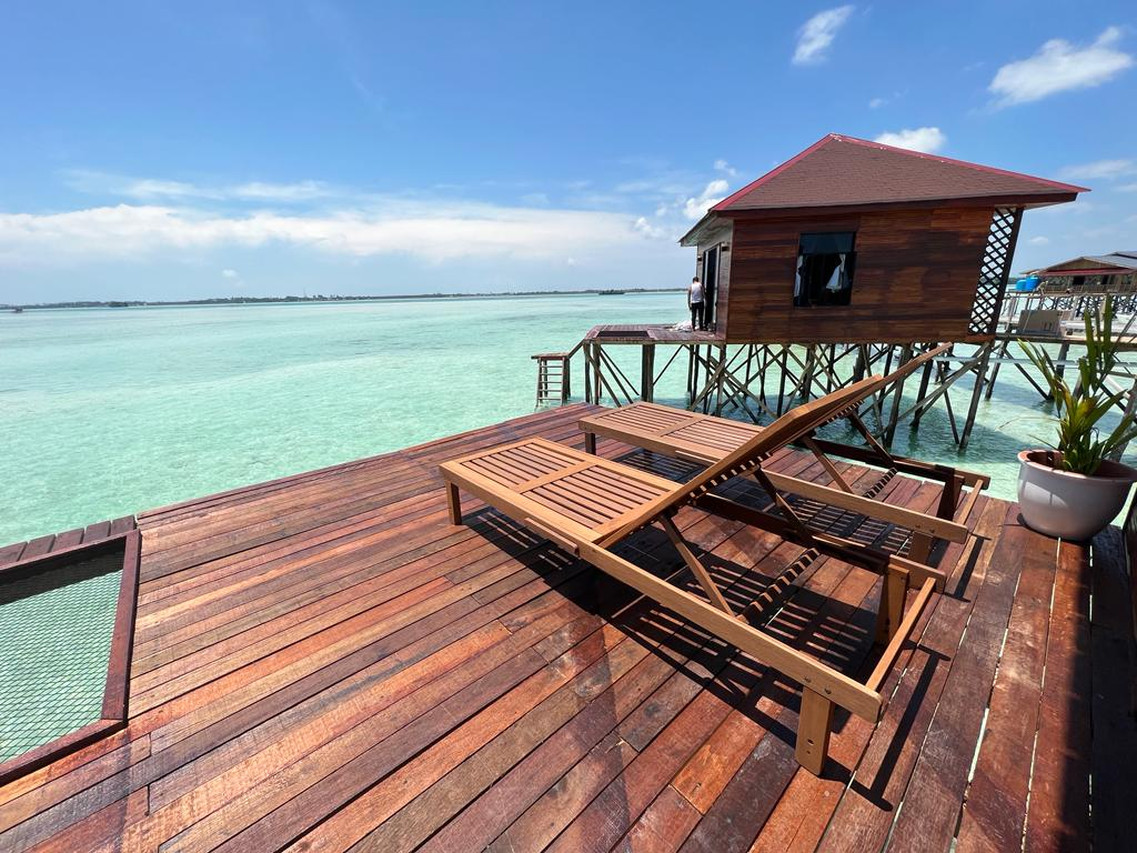 Premier Villa spacious sun deck with loungers