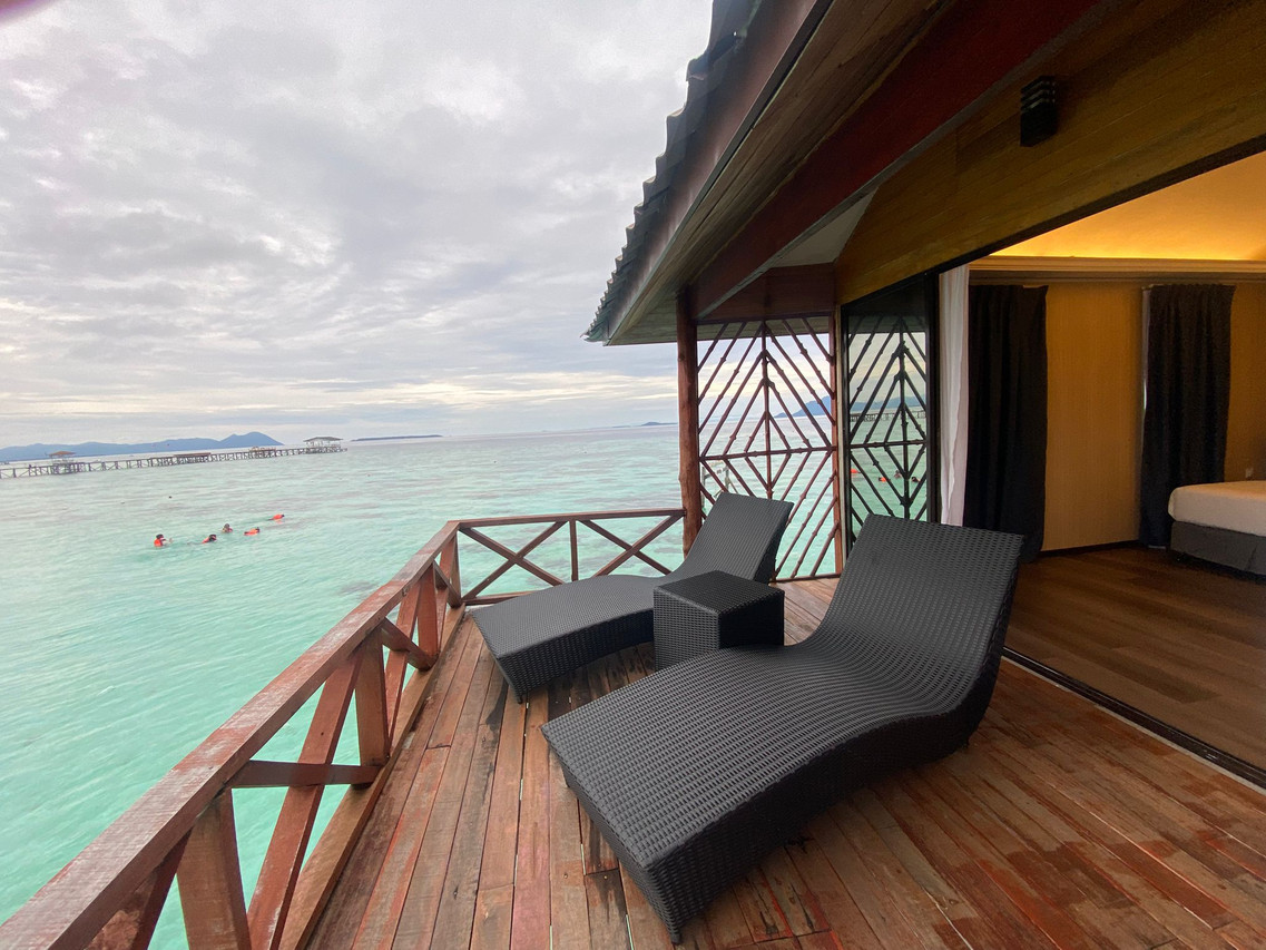 Sunset Villa private balcony with sun loungers